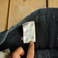 Vintage 2000s Carhartt Distressed Double Knee Denim Work Jeans Men's Medium 33 x 32 from propervintagecanada