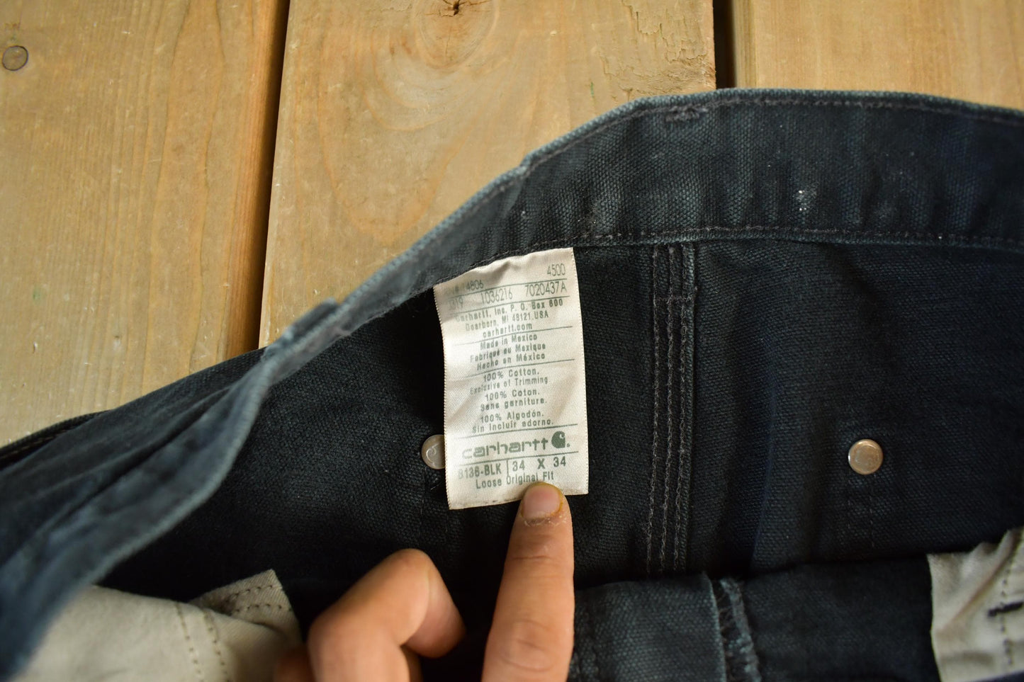 Vintage 2000s Carhartt Distressed Double Knee Denim Work Jeans Men's Medium 33 x 32 from propervintagecanada