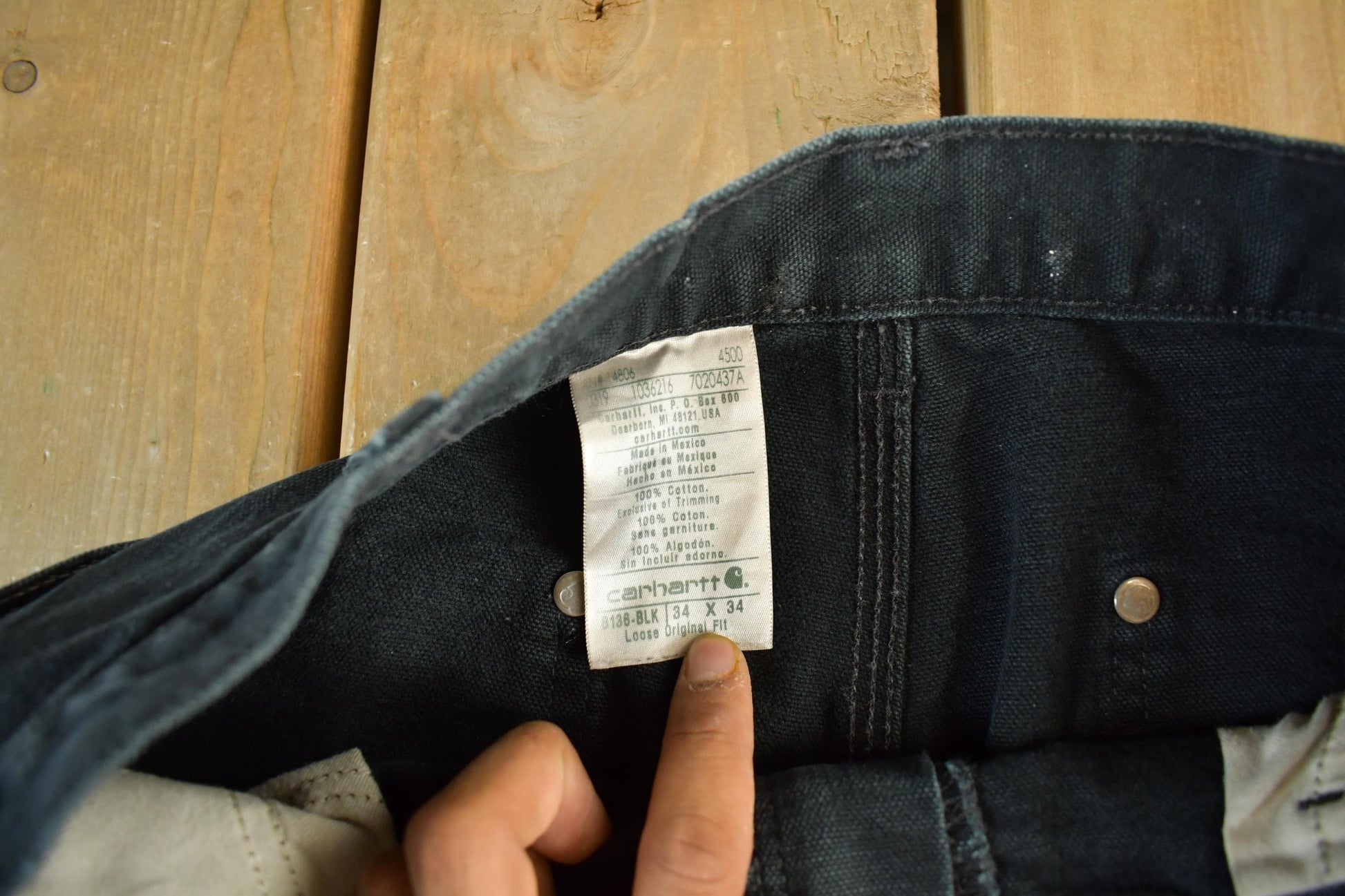 Vintage 2000s Carhartt Distressed Double Knee Denim Work Jeans Men's Medium 33 x 32 from propervintagecanada