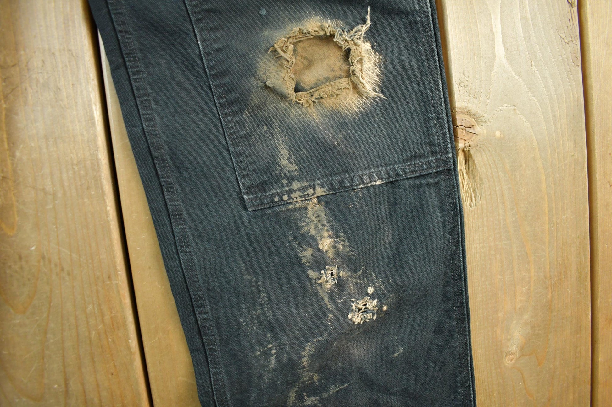 Vintage 2000s Carhartt Distressed Double Knee Denim Work Jeans Men's Medium 33 x 32 from propervintagecanada