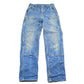 Vintage 2000s Carhartt Distressed Double Knee Denim Work Jeans Men's Medium 33 x 36 from propervintagecanada