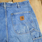 Vintage 2000s Carhartt Distressed Double Knee Denim Work Jeans Men's Medium 33 x 36 from propervintagecanada