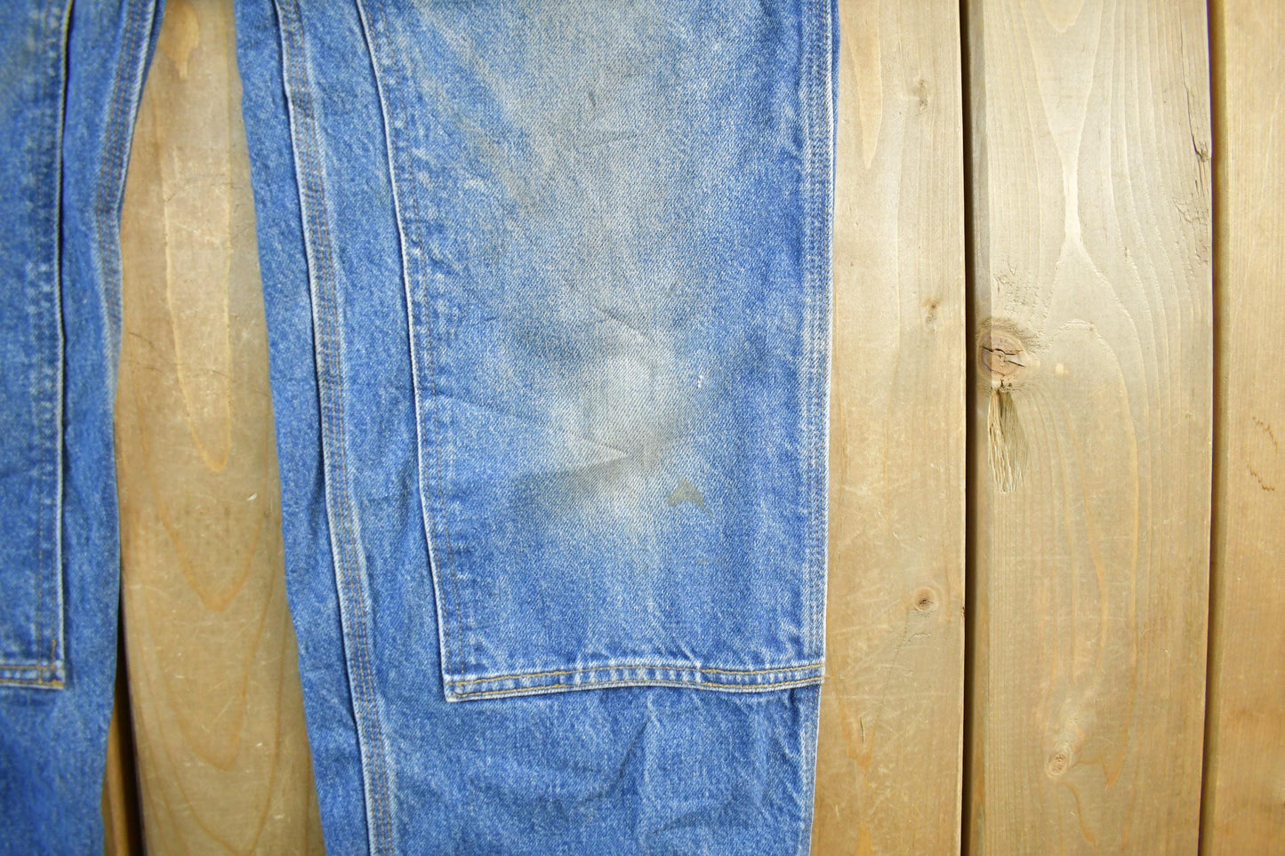 Vintage 2000s Carhartt Distressed Double Knee Denim Work Jeans Men's Medium 33 x 36 from propervintagecanada