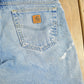 Vintage 2000s Carhartt Distressed Flannel Lined Denim Work Jeans Men's 34 x 33 from propervintagecanada