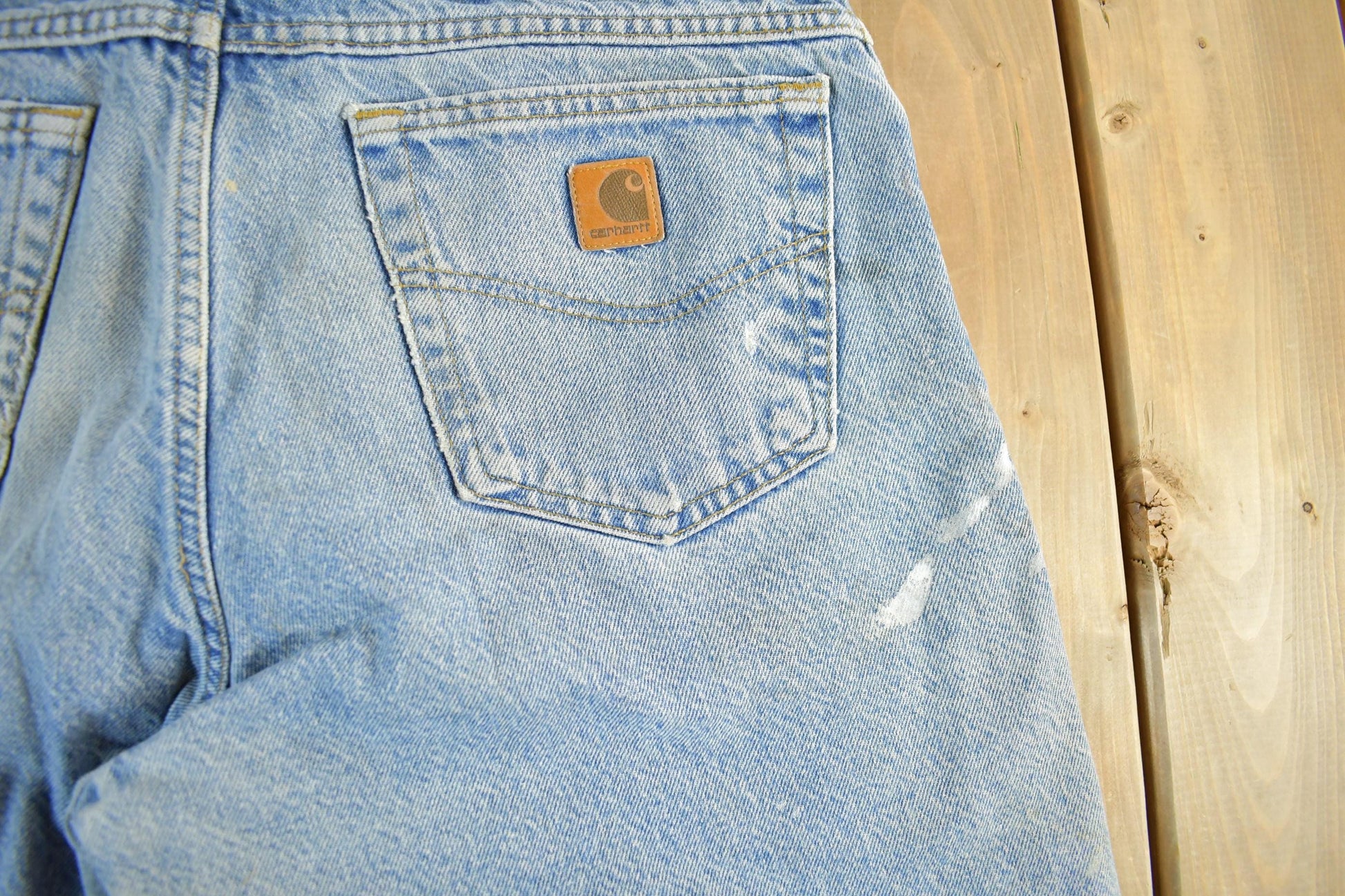 Vintage 2000s Carhartt Distressed Flannel Lined Denim Work Jeans Men's 34 x 33 from propervintagecanada
