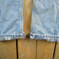 Vintage 2000s Carhartt Distressed Flannel Lined Denim Work Jeans Men's 34 x 33 from propervintagecanada