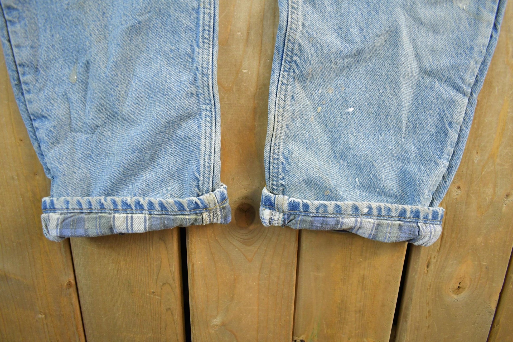 Vintage 2000s Carhartt Distressed Flannel Lined Denim Work Jeans Men's 34 x 33 from propervintagecanada