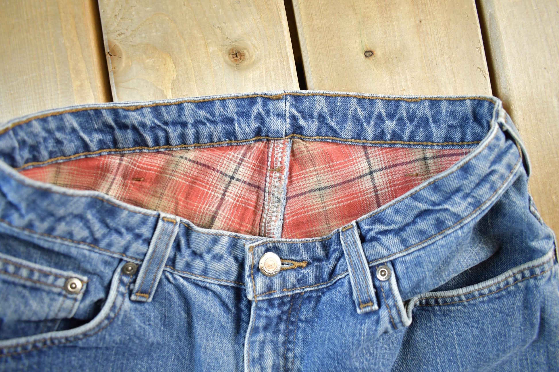 Vintage 2000s Carhartt Distressed Flannel Lined Denim Work Jeans Women's 29 x 32 from propervintagecanada