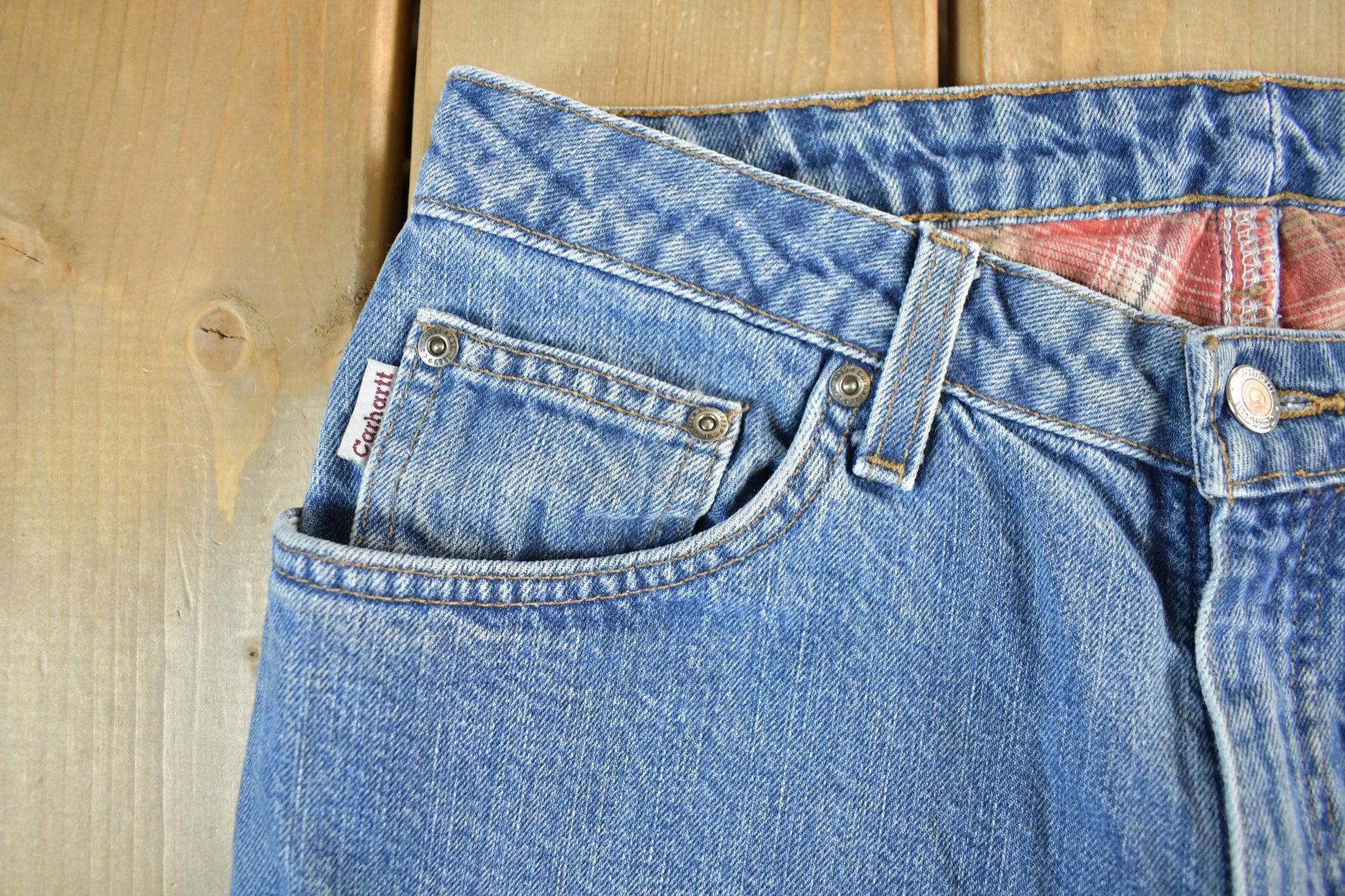 Vintage 2000s Carhartt Distressed Flannel Lined Denim Work Jeans Women's 29 x 32 from propervintagecanada
