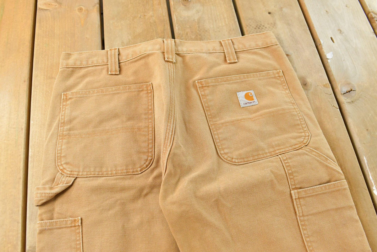 Vintage 2000s Carhartt Double Knee Tan Canvas Pants Men's 34 x 30 from propervintagecanada
