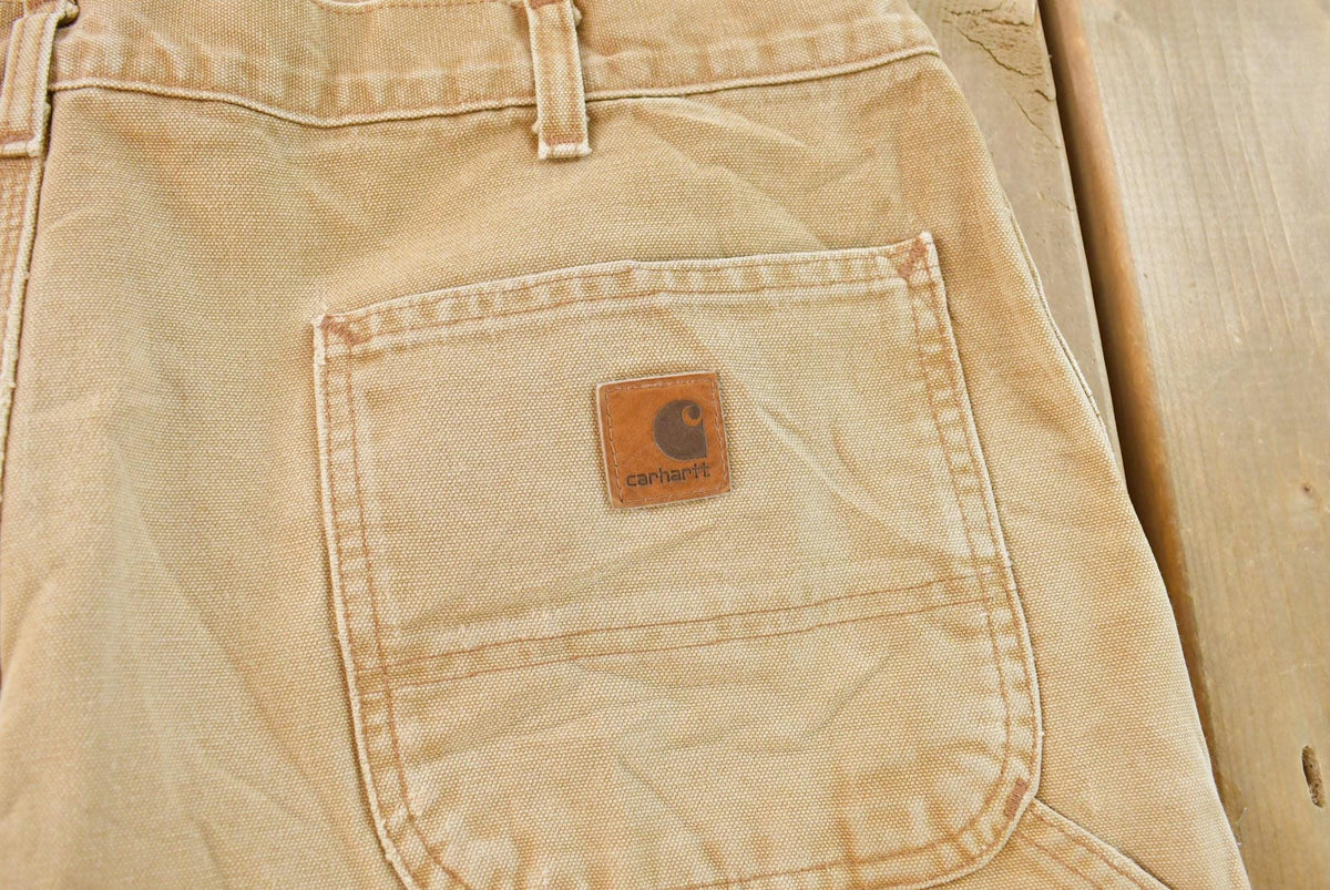 Vintage 2000s Carhartt Flannel Lined Canvas Work Pants Men's 37 x 31 from propervintagecanada