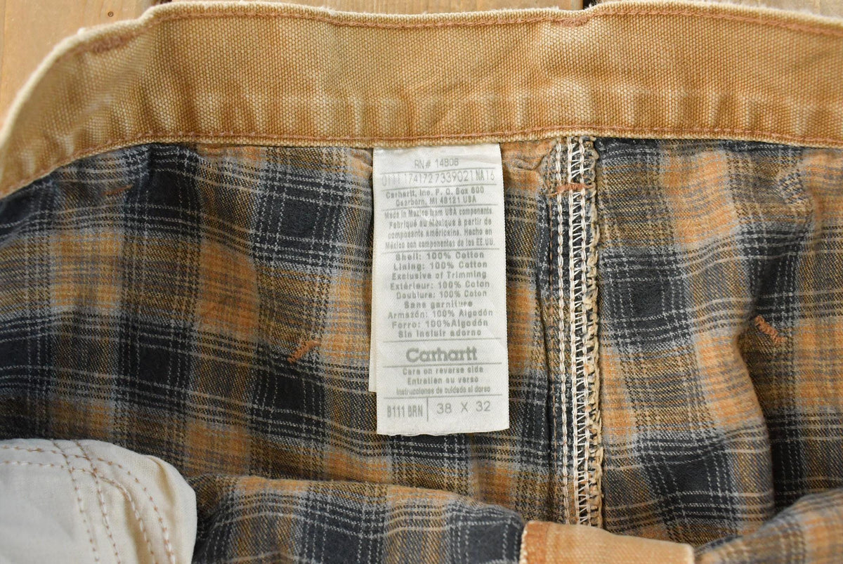 Vintage 2000s Carhartt Flannel Lined Canvas Work Pants Men's 37 x 31 from propervintagecanada