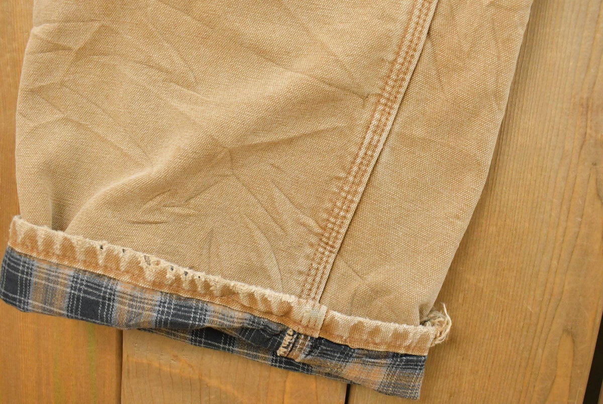 Vintage 2000s Carhartt Flannel Lined Canvas Work Pants Men's 37 x 31 from propervintagecanada