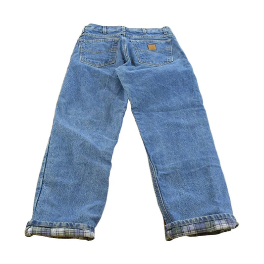Vintage 2000s Carhartt Flannel Lined Denim Work Jeans Men's 32 x 31 from propervintagecanada