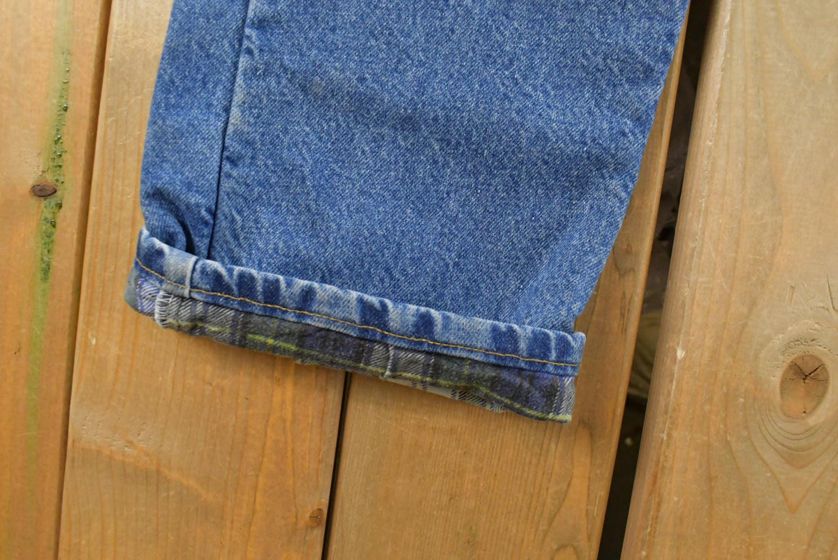Vintage 2000s Carhartt Flannel Lined Denim Work Jeans Men's 32 x 31 from propervintagecanada
