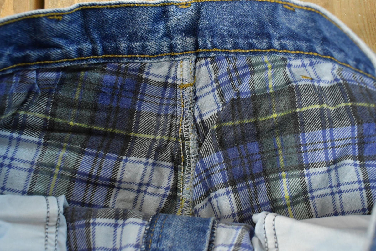 Vintage 2000s Carhartt Flannel Lined Denim Work Jeans Men's 32 x 31 from propervintagecanada