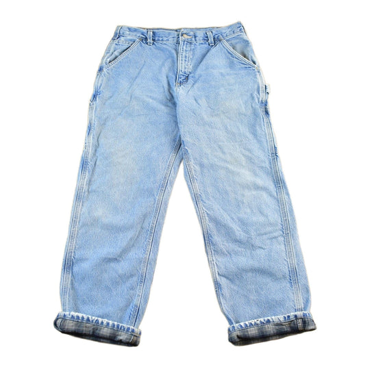 Vintage 2000s Carhartt Flannel Lined Denim Work Jeans Men's 33 x 30 from propervintagecanada