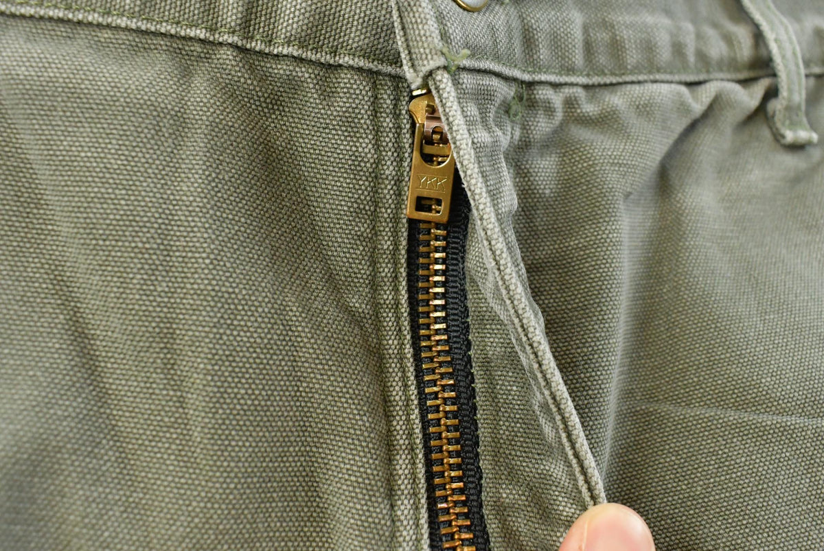 Vintage 2000s Carhartt Flannel Lined Green Work Jeans Men's 36 x 31 from propervintagecanada