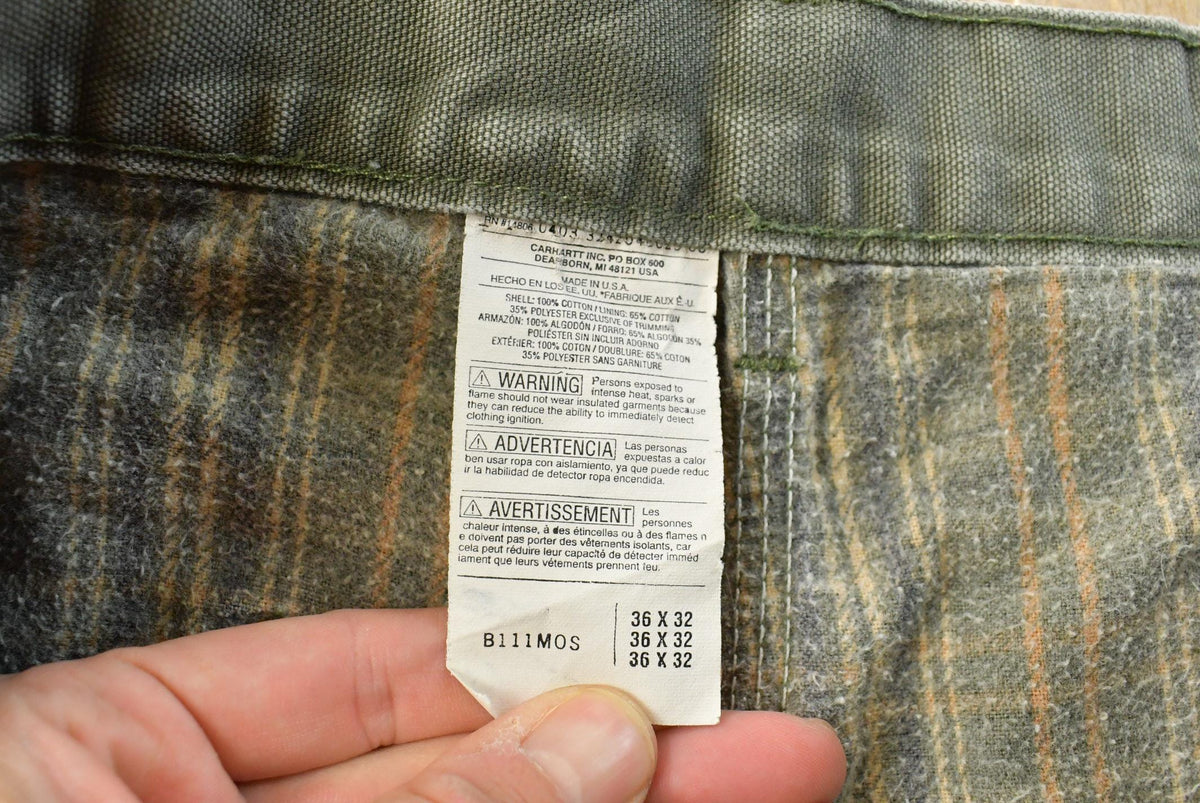 Vintage 2000s Carhartt Flannel Lined Green Work Jeans Men's 36 x 31 from propervintagecanada