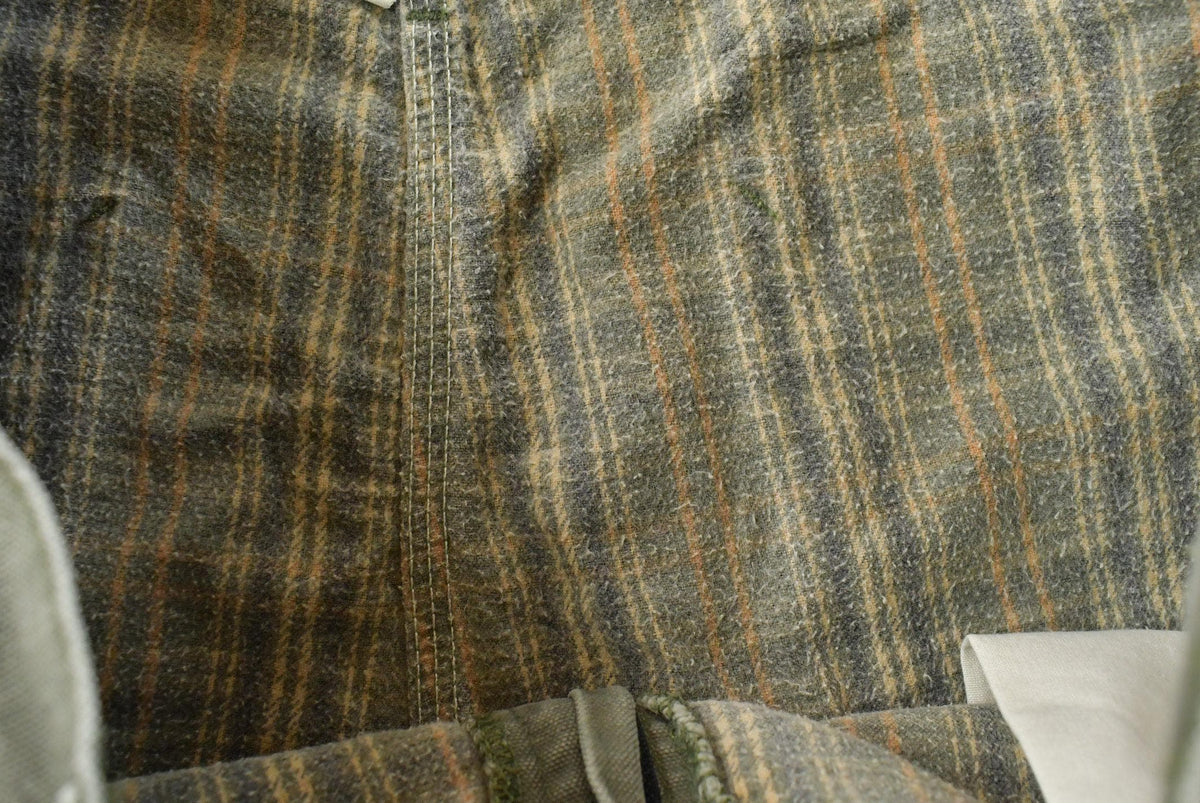 Vintage 2000s Carhartt Flannel Lined Green Work Jeans Men's 36 x 31 from propervintagecanada