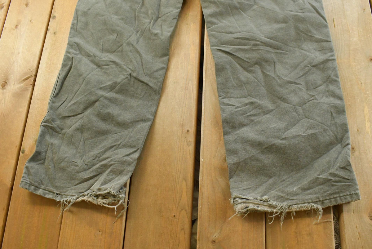 Vintage 2000s Carhartt Flannel Lined Green Work Jeans Men's 36 x 31 from propervintagecanada