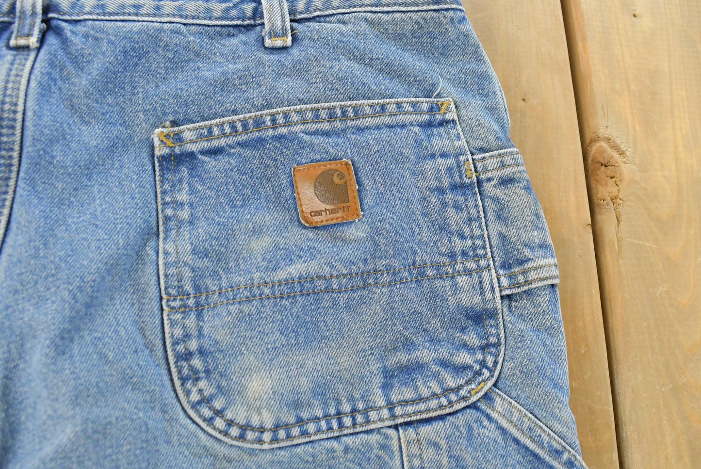 Vintage 2000s Carhartt Fleece Lined Denim Work Jeans Men's 35 x 31 from propervintagecanada