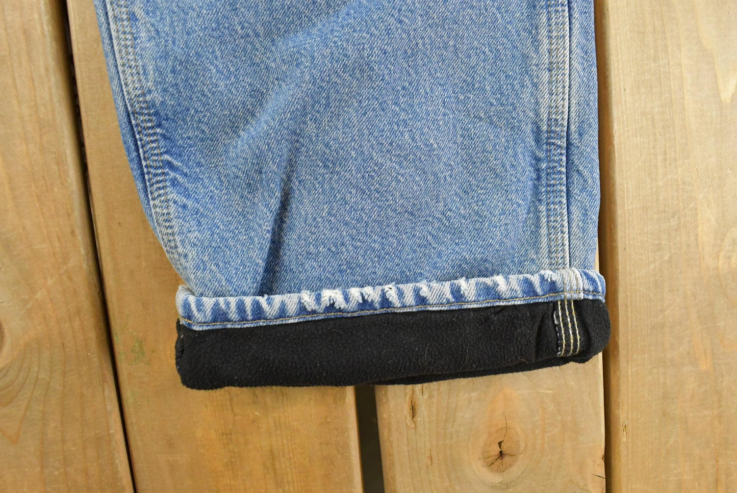 Vintage 2000s Carhartt Fleece Lined Denim Work Jeans Men's 35 x 31 from propervintagecanada