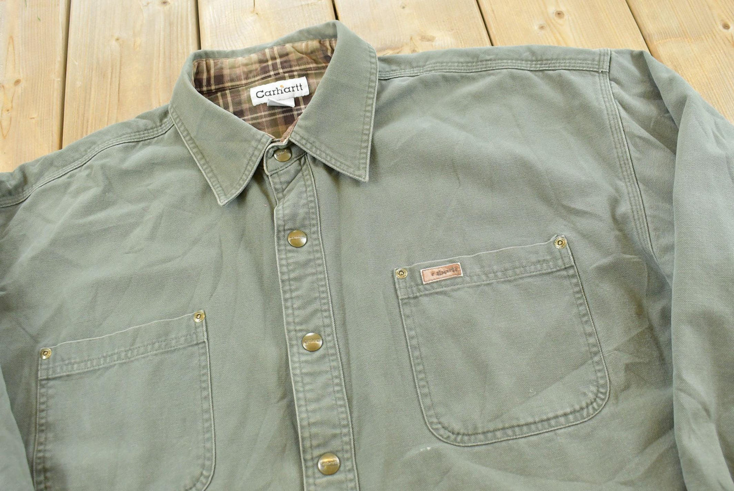 Vintage 2000s Carhartt Heavyweight Thrashed Lined Workwear Button Up Shirt Men's 2XL from propervintagecanada