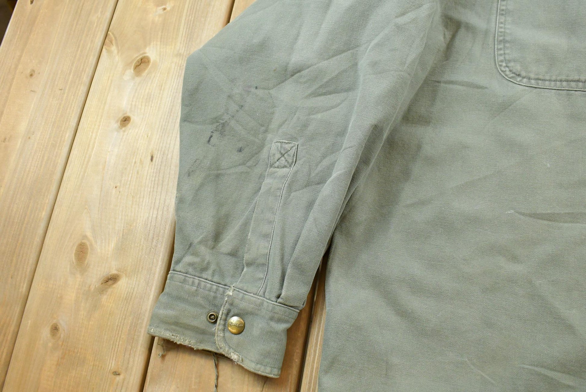 Vintage 2000s Carhartt Heavyweight Thrashed Lined Workwear Button Up Shirt Men's 2XL from propervintagecanada