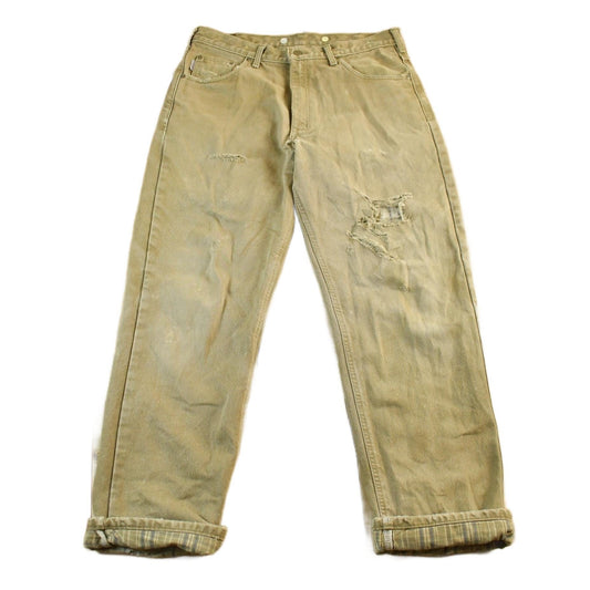 Vintage 2000s Carhartt Lined Carpenter Work Denim Jeans Men's 34 x 31 from propervintagecanada