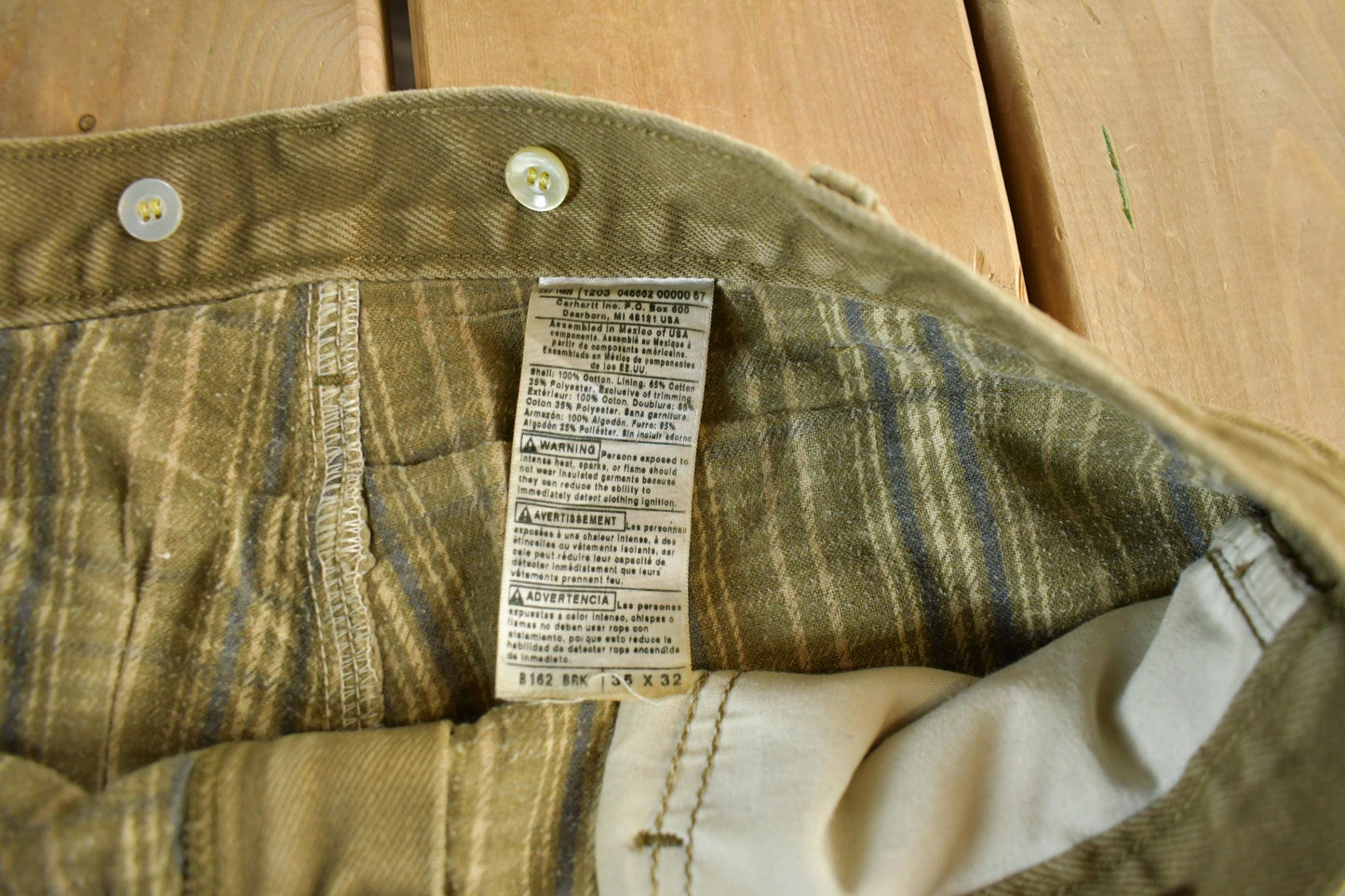 Vintage 2000s Carhartt Lined Carpenter Work Denim Jeans Men's 34 x 31 from propervintagecanada
