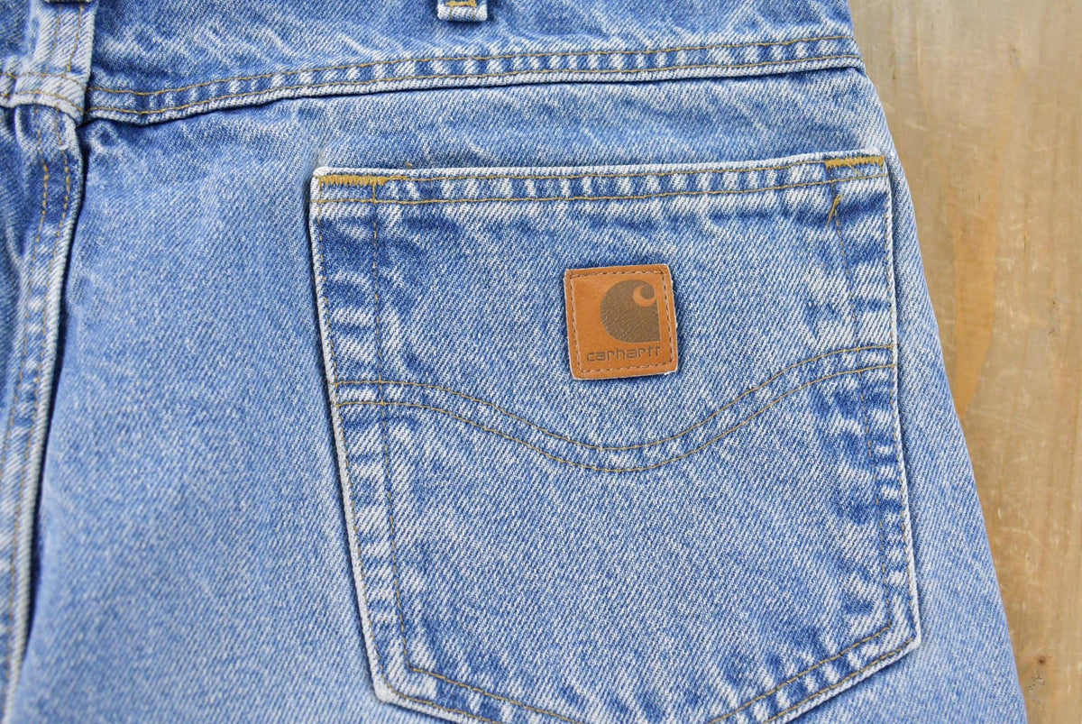 Vintage 2000s Carhartt Loose Fit Distressed Workwear Denim Jeans Men's 35 x 34.5 from propervintagecanada