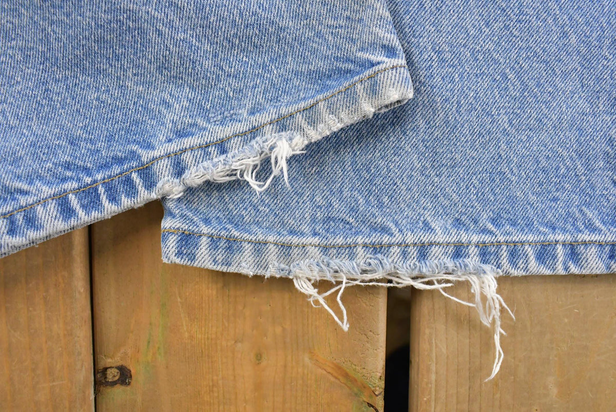 Vintage 2000s Carhartt Loose Fit Distressed Workwear Denim Jeans Men's 35 x 34.5 from propervintagecanada