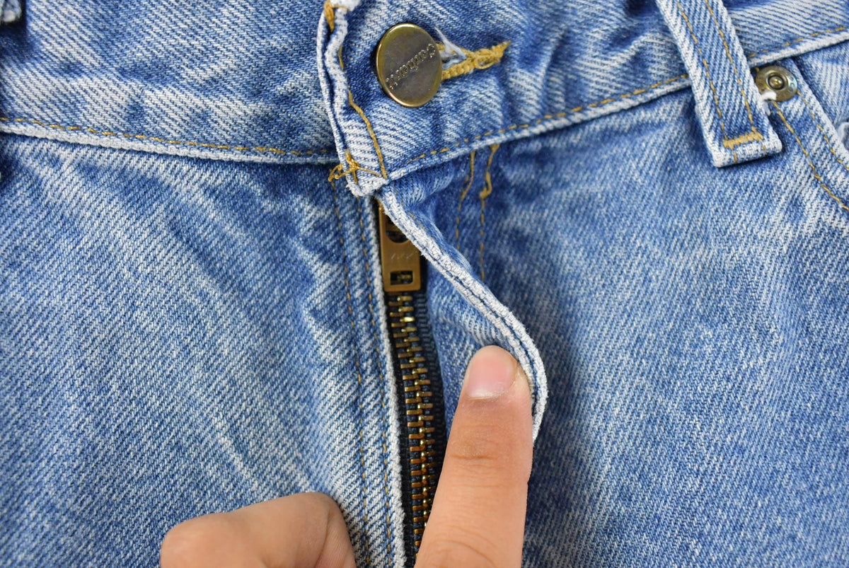 Vintage 2000s Carhartt Loose Fit Distressed Workwear Denim Jeans Men's 35 x 34.5 from propervintagecanada