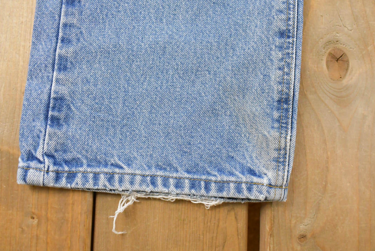 Vintage 2000s Carhartt Loose Fit Distressed Workwear Denim Jeans Men's 35 x 34.5 from propervintagecanada