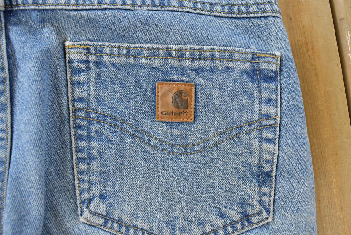 Vintage 2000s Carhartt Relaxed Fit Distressed Workwear Denim Jeans Men's 35 x 31.5 from propervintagecanada