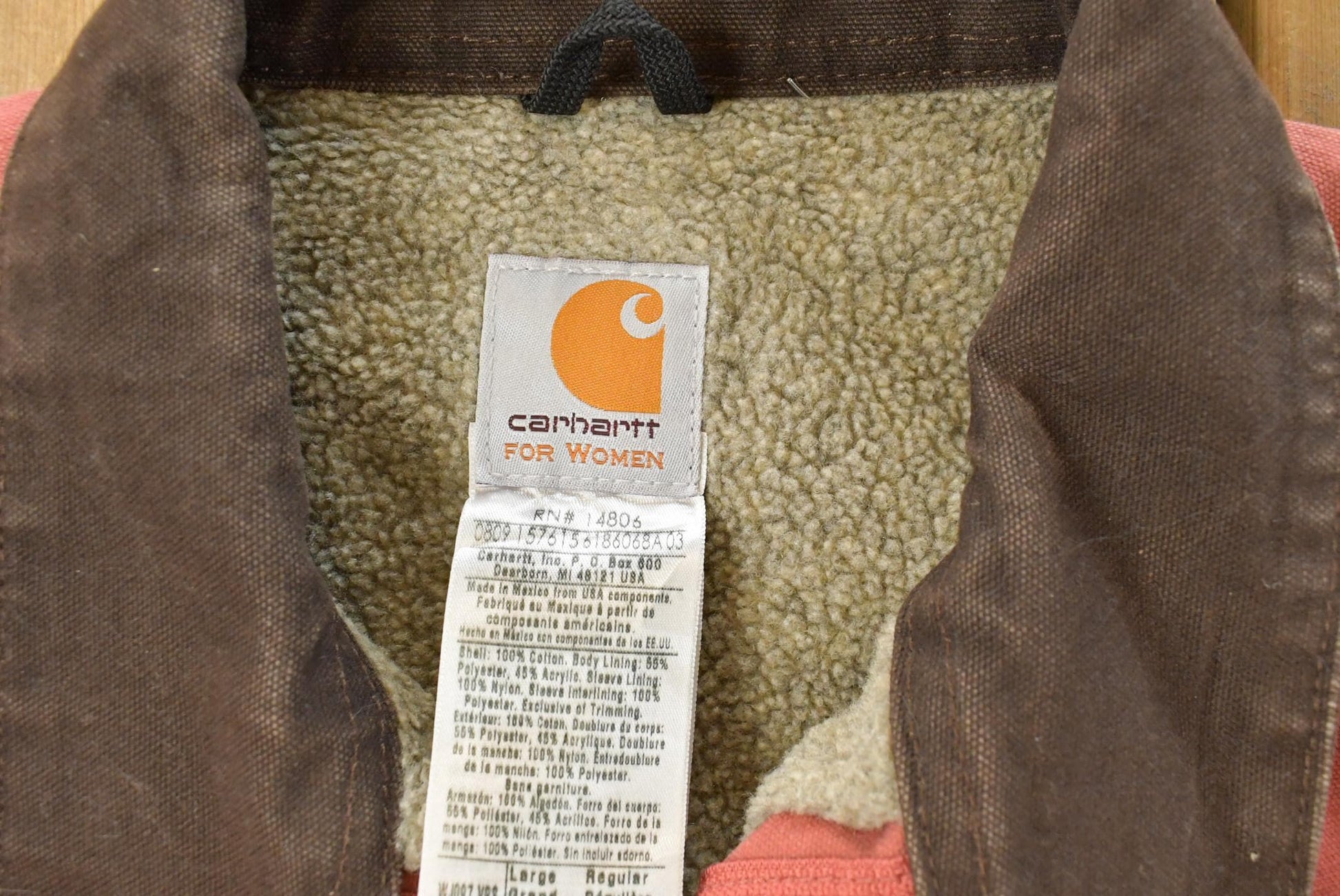 Vintage 2000s Carhartt Sherpa Lined Salmon Detroit Jacket Women's Large from propervintagecanada