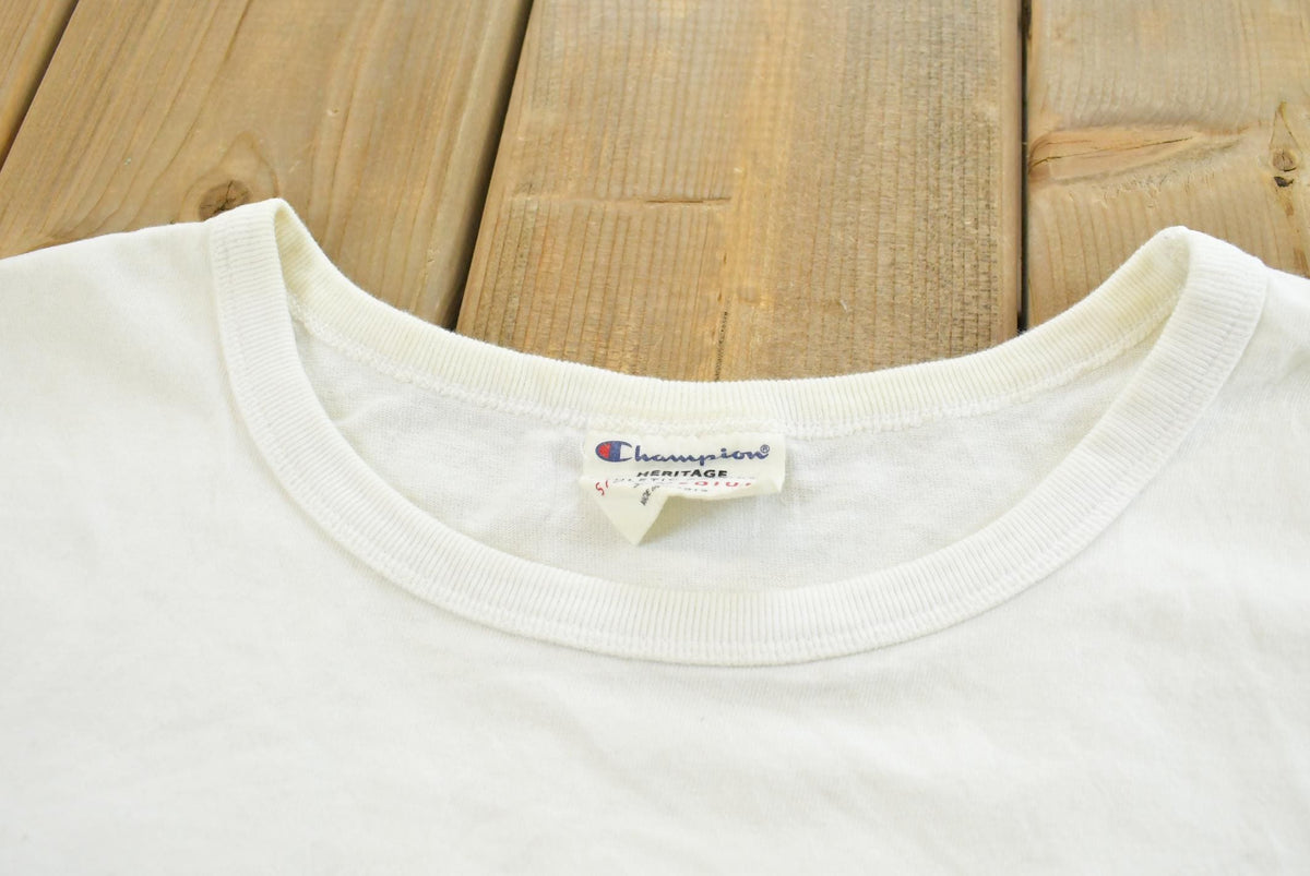 Vintage 2000s Champion Spellout T-Shirt Women's Cropped L from propervintagecanada