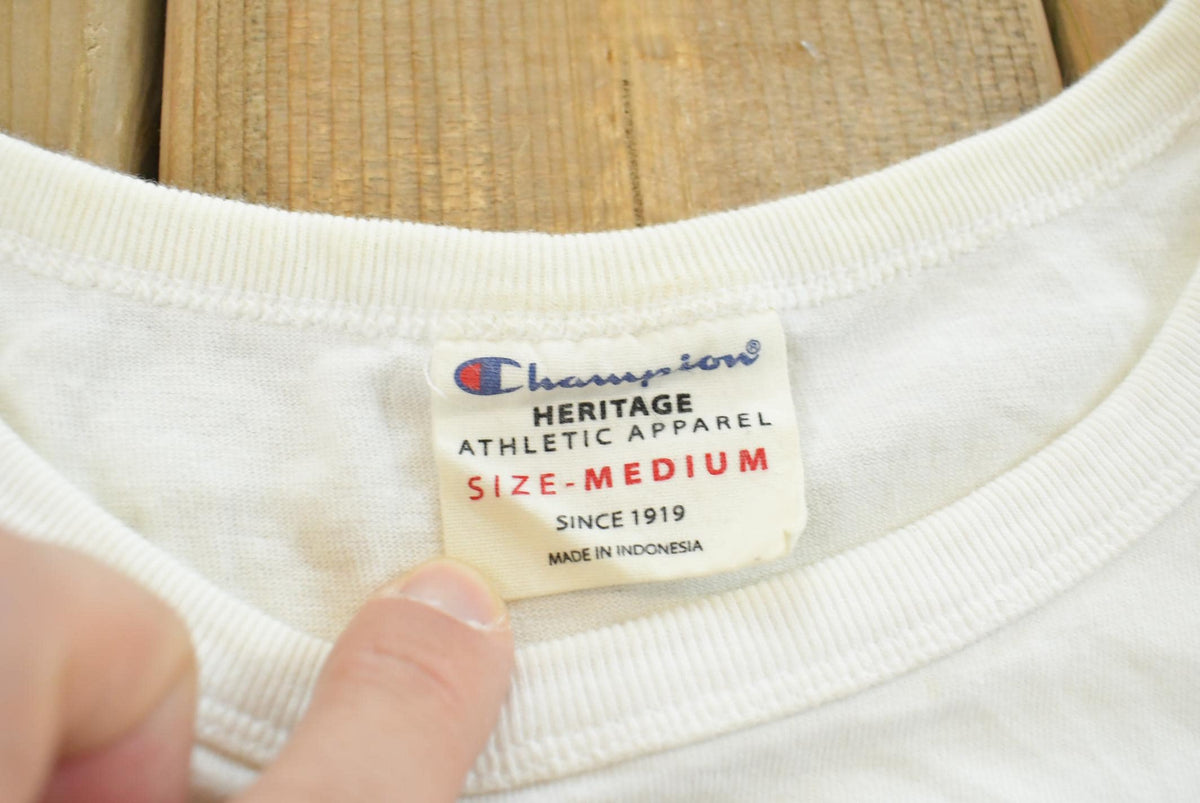 Vintage 2000s Champion Spellout T-Shirt Women's Cropped L from propervintagecanada