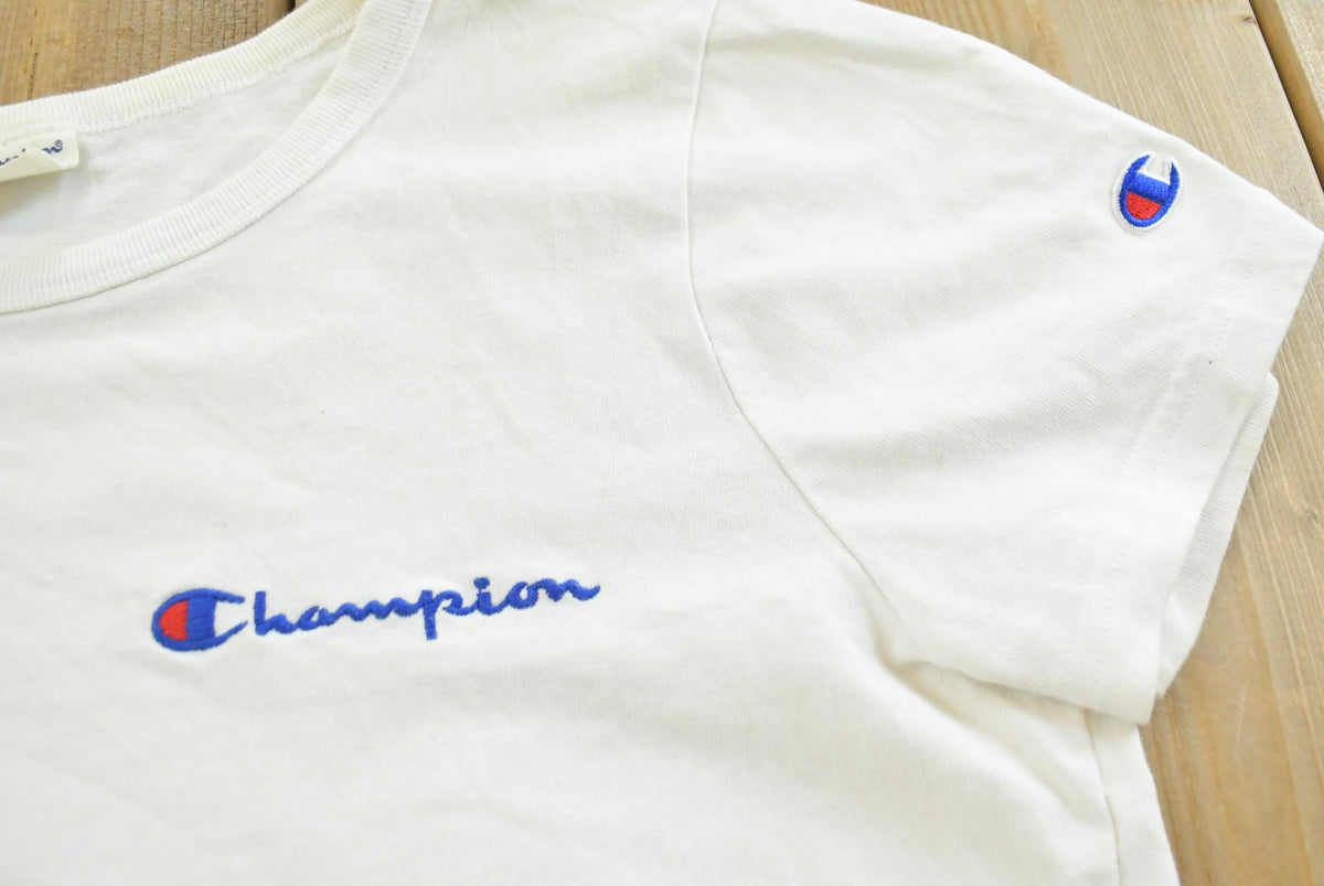 Vintage 2000s Champion Spellout T-Shirt Women's Cropped L from propervintagecanada