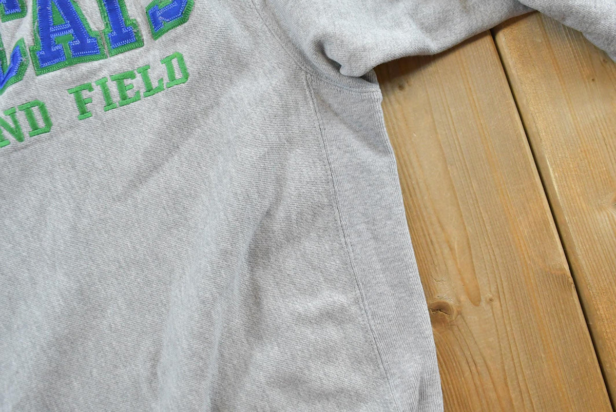 Vintage 2000s Champion Wildcats Track & Field Crewneck Sweatshirt Men's M from propervintagecanada
