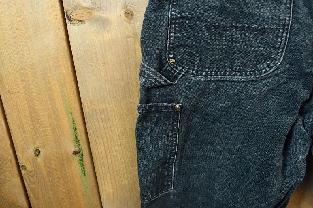 Vintage 2000s Double Knee Riveted Carhartt Dungaree Work Pants Men's Small 29 x 30 from propervintagecanada