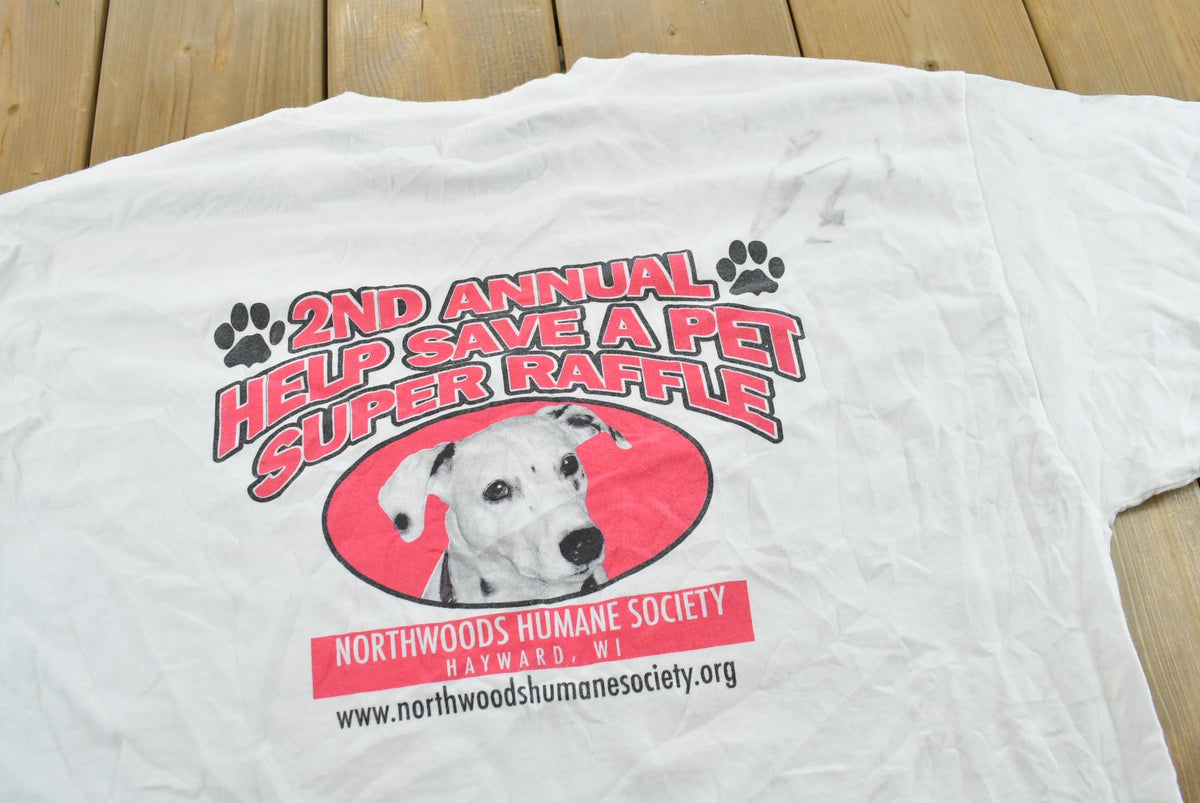 Vintage 2000s Hayward Wisconsin Humane Society Raffle Charity Dog Pets T-Shirt Men's XL from propervintagecanada