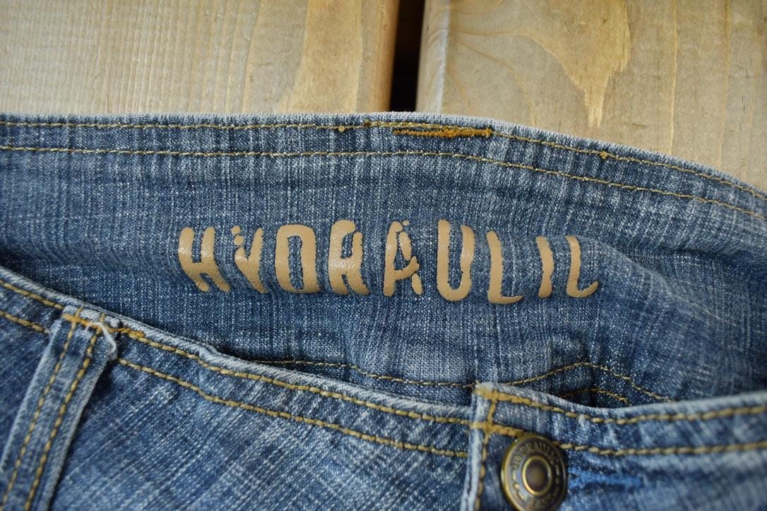 Vintage 2000s Hydraulic Low Waisted Boot Cut Denim Jeans Women's 26 x 30 from propervintagecanada