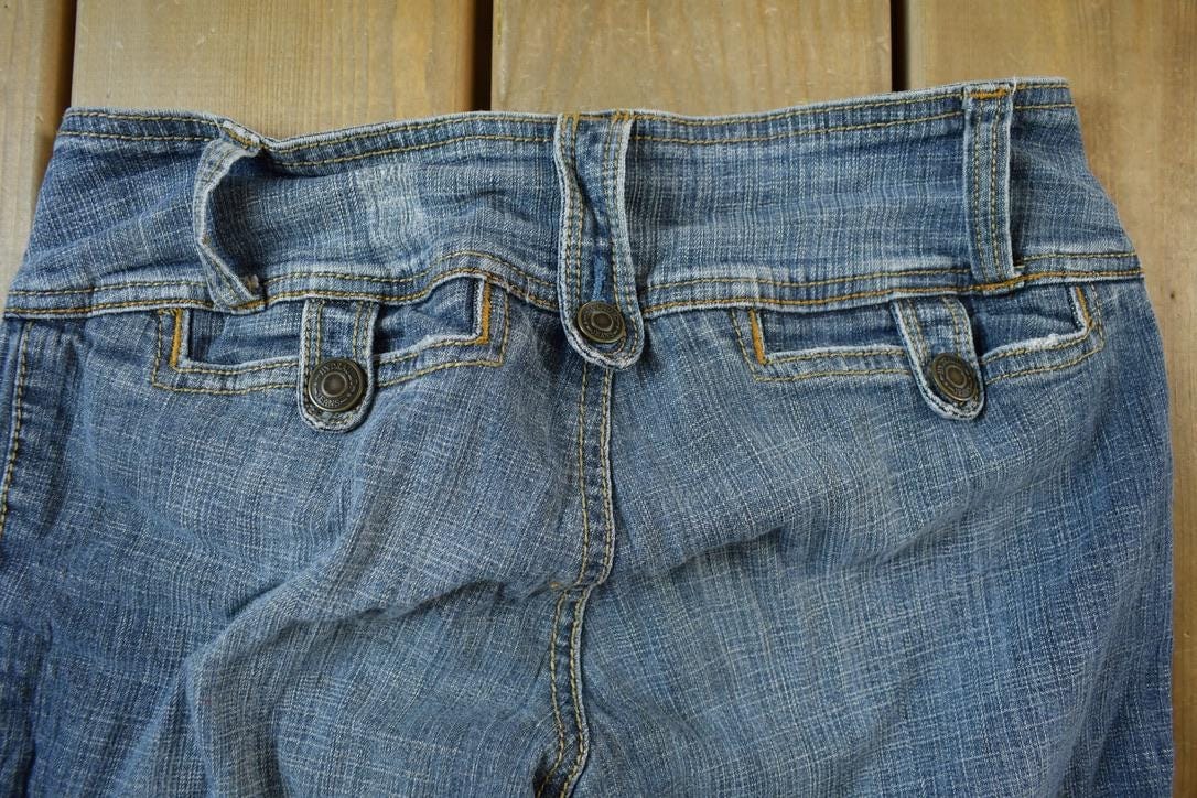 Vintage 2000s Hydraulic Low Waisted Boot Cut Denim Jeans Women's 26 x 30 from propervintagecanada
