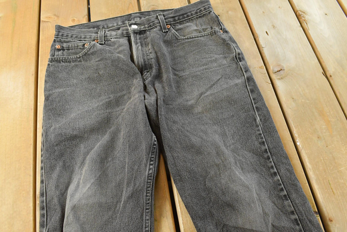 Vintage 2000s Levi's 505 Regular Straight Fit Starched Denim Black Jeans Men's 33 x 27.5 from propervintagecanada