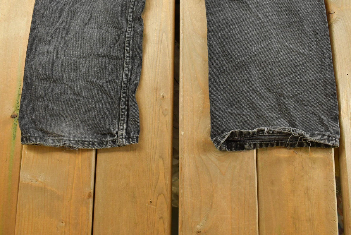 Vintage 2000s Levi's 505 Regular Straight Fit Starched Denim Black Jeans Men's 33 x 27.5 from propervintagecanada