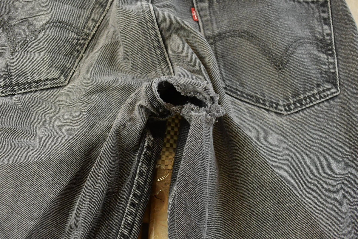 Vintage 2000s Levi's 505 Regular Straight Fit Starched Denim Black Jeans Men's 33 x 27.5 from propervintagecanada