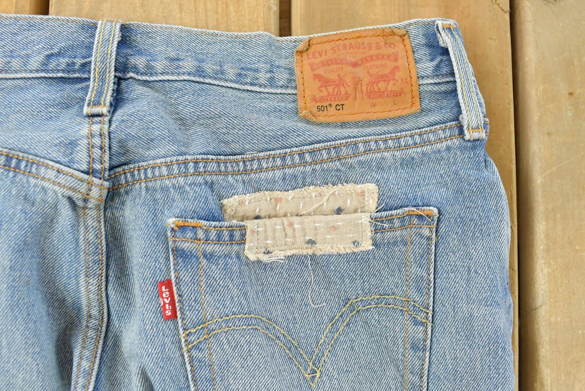Vintage 2000s Levi's Distressed Patchwork Denim Jeans Men's 30 x 28 from propervintagecanada
