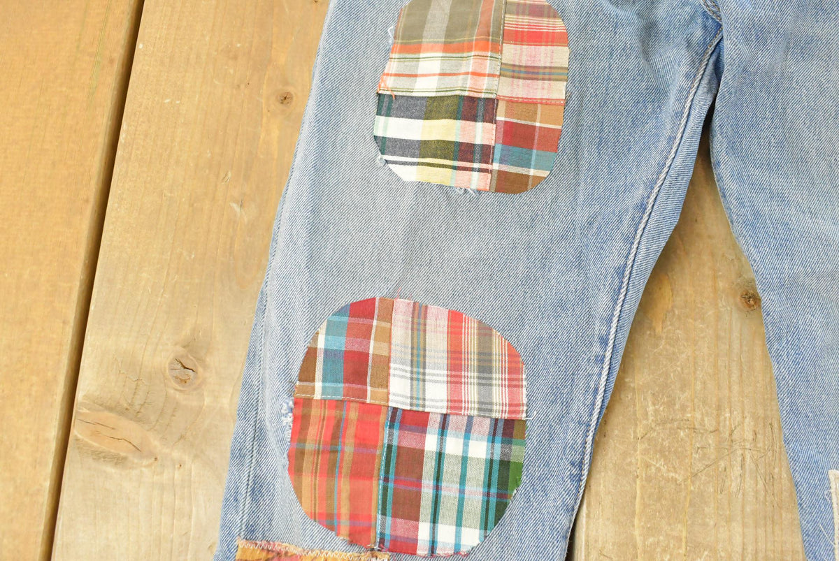 Vintage 2000s Levi's Distressed Patchwork Denim Jeans Men's 30 x 28 from propervintagecanada